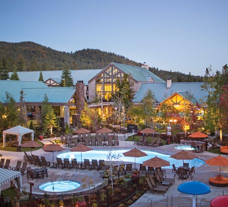View of the lodge nestled in the woods