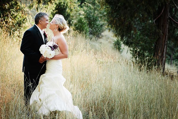 Mark Janzen wedding photography: photo of couple in meadow at Tenaya Lodge